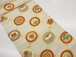 市松に草花・蝶丸文模様織出し名古屋帯